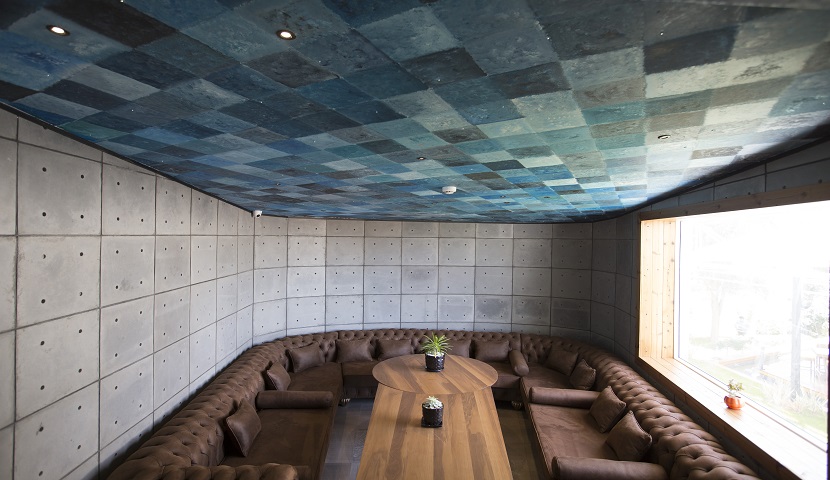 Restaurant design with Sadr Stone exposed concrete tiles